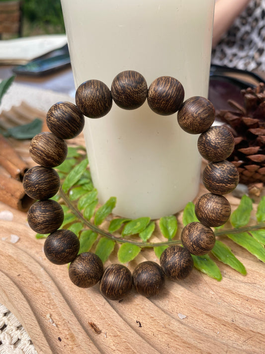 Agarwood bracelet from Takaran Island, Indonesia. Only available in 12mm size. Strong and sweet fragrance.